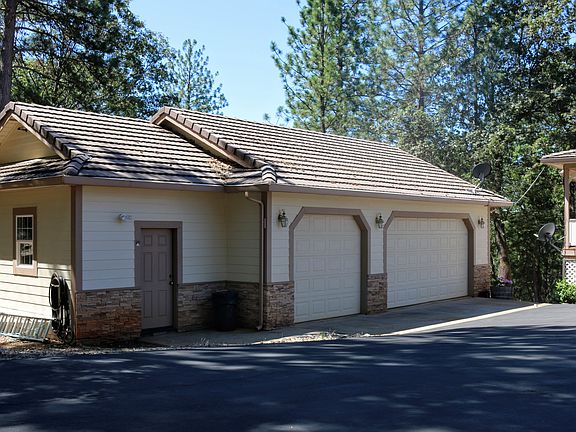 3-car Garage PLUS SHOP!