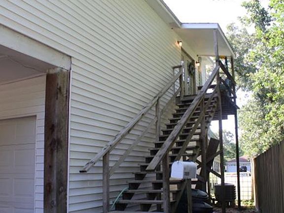 Side to garage apartment.