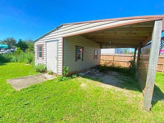 Workshop and Covered Parking