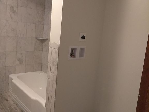 Laundry hook-ups in bathroom