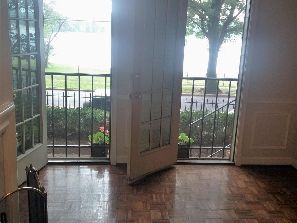 Living room with water views of Georgetown reservoir and french doors.
