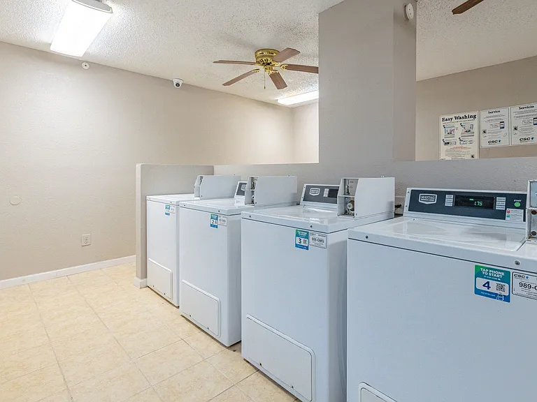 On-site laundry facility equipped with multiple washers and dryers