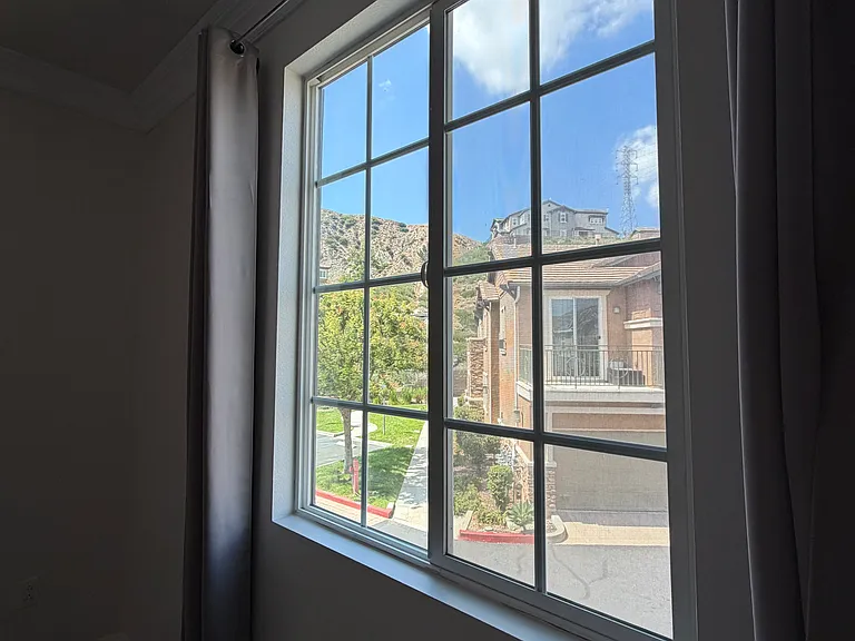 Comfortable second bedroom with spacious closet and beautiful views.