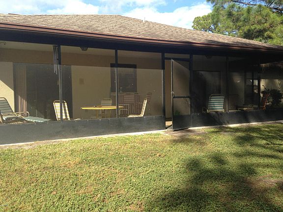 Large back porch to enjoy the Florida weather