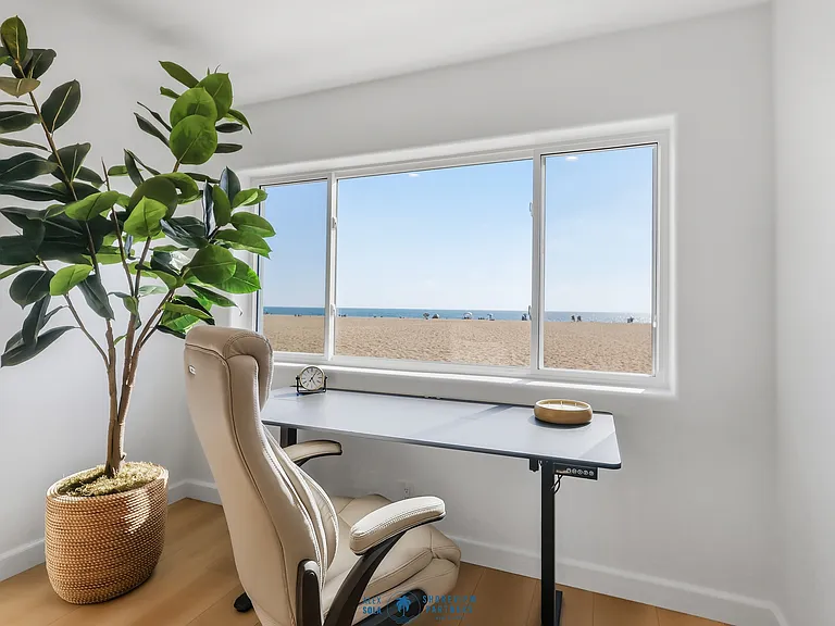 First level offers working and lounge area with full bathroom and bar.