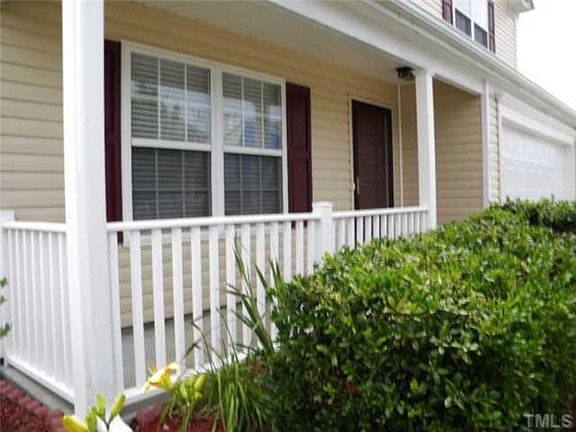 Greet the neighbors on the cozy rocking chair front porch,
