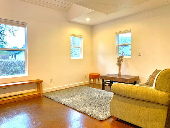 Main living space. Radiant heat in burnished concrete floors, south-facing glass.