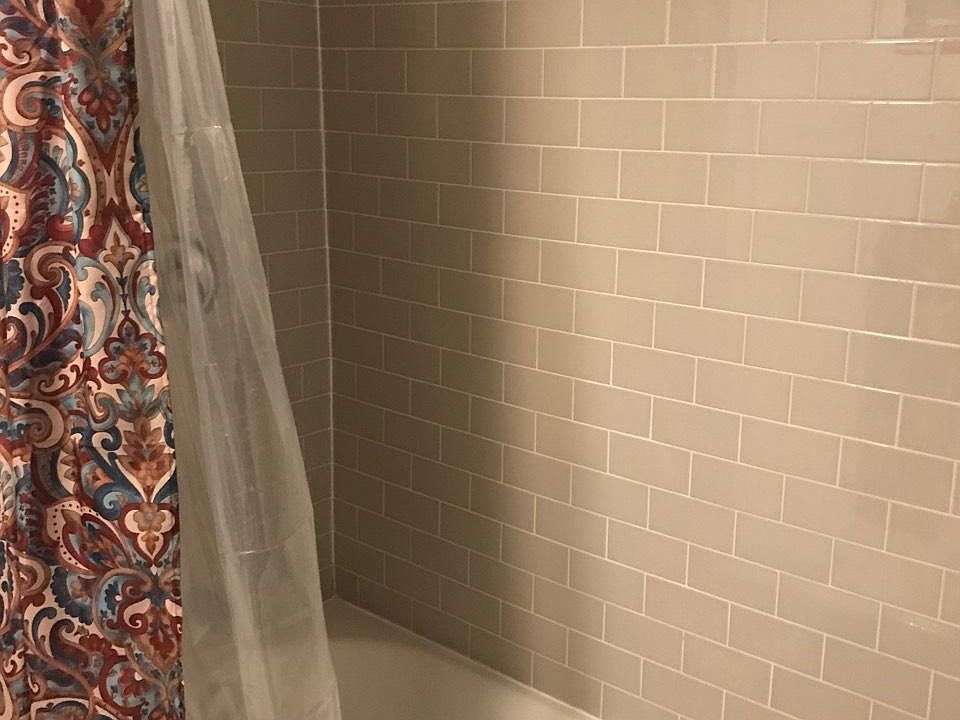Bathroom with beautiful gray subway tile