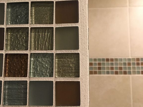 Downstairs shower tiling