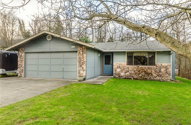 Updated 3 Bedroom, 2 bath Rambler with RV parking located in the