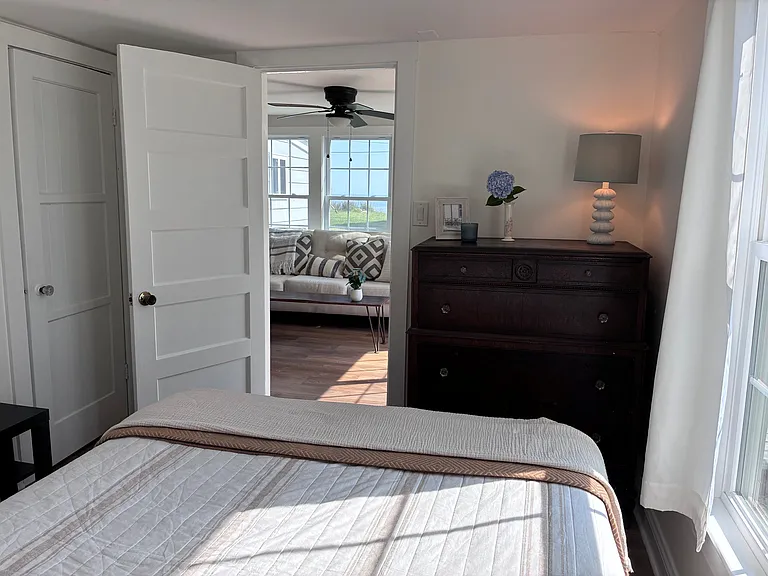 Bedroom #1 looking out toward living room and front water view
