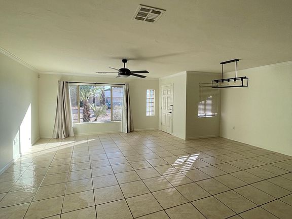 Newly painted and cleaned Great Room, view of front door from back door