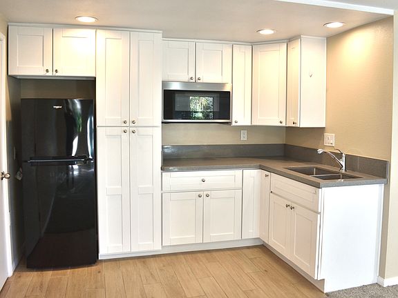 Kitchenette with Microwave and Convection Oven, Fridge, Stovetop, and Full Size Sink