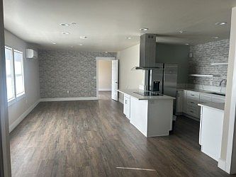 1st image of 9750 NE Fox Farm Rd APT 1