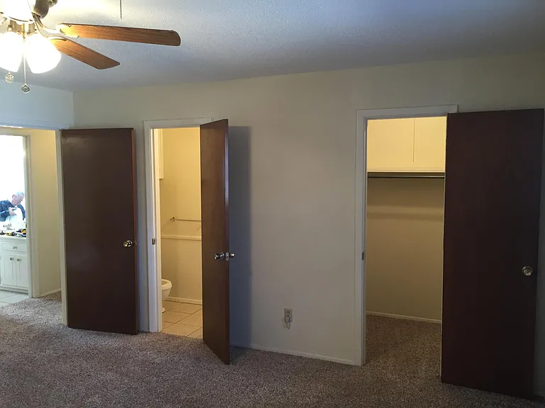 Master bedroom with attached half bath