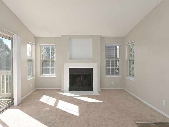 Cozy comfort meets modern style by the hearth.