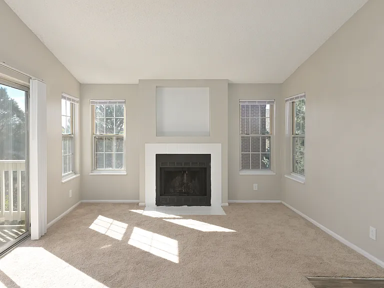 Cozy comfort meets modern style by the hearth.