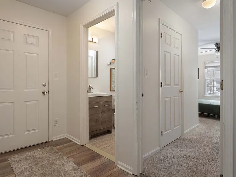 Gracious foyer entry with renovated flooring.