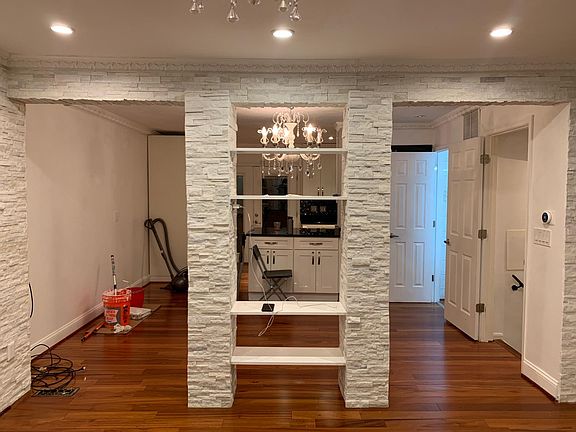 View from Living Area to Dining Area and Kitchen
