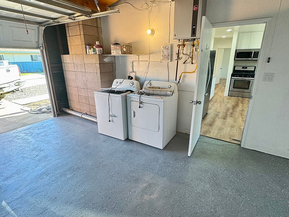 garage off of kitchen. includes washer dryer and automatic garage door. new epoxy floor spray.