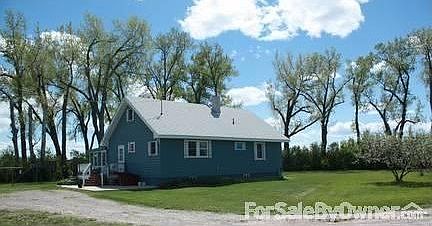 Large yard with well established trees