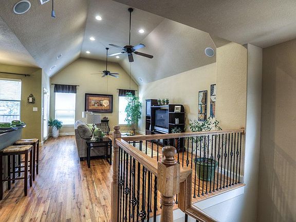 Large living room with vaulted ceilings.