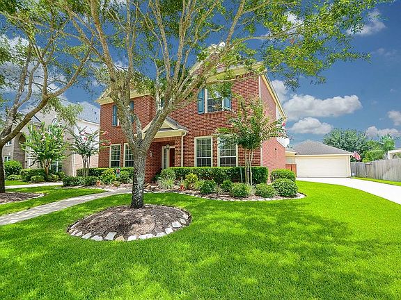 Curb appeal is abundant as you drive up to this gorgeous home.