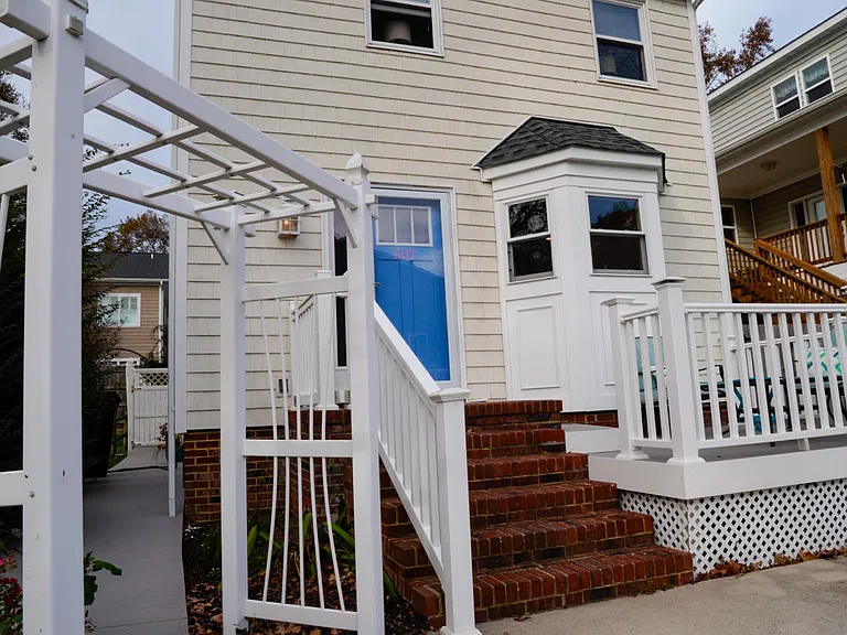 Access to secured back deck from the front