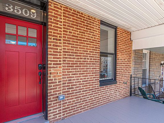 Gorgeous red front door and large front porch that sits back nicely, with large front sidewalk! Great for people watching and relaxing with a book. Just a block off the avenue and plenty of free angled parking for guests and you to use!