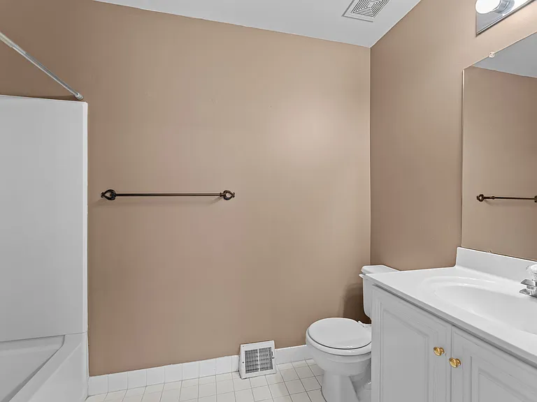 full hall bath serving bedrooms 2 and 3