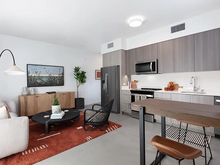 Kitchen and living space at Star Harbor Apartments & Townhomes in Alameda, CA.
