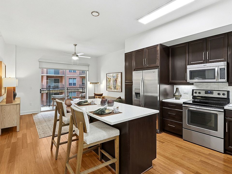 Open Kitchen with Stainless Steel Appliances