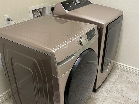 Laundry Room with matching Samsung Washer & Dryer set (champagne colored)