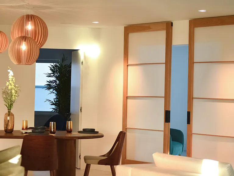 Large dining area, seats 8+ right off of the sunroom/living room
