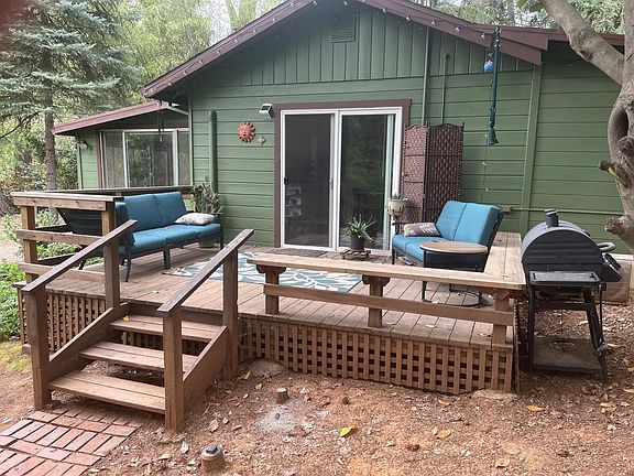 Front Deck Entrance (with Current tenant's furniture.)