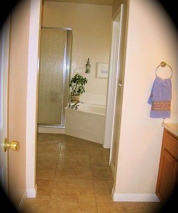 marble in master bathroom/walk-in closet and separate 6ft soaking tub