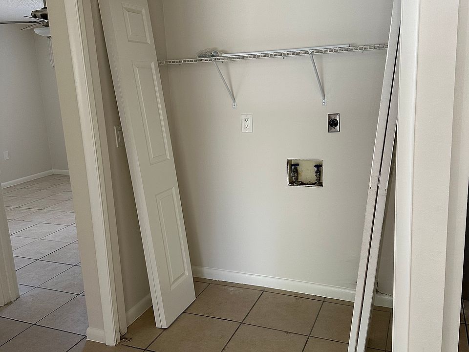 Indoor laundry area with hook ups