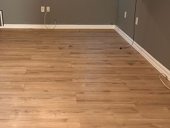 living room with brand new flooring