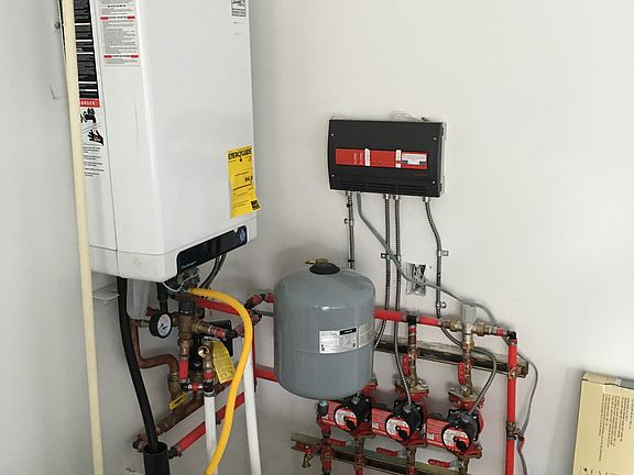 ON DEMAND HIGH EFFICIENCY INFLOOR RADIANT HEATING SYSTEM ON