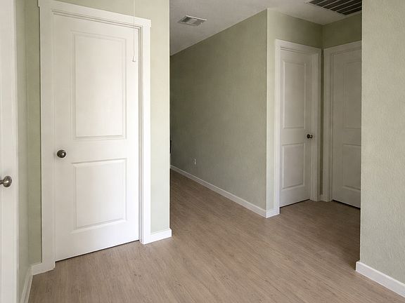 Entry hallway leading into main bedroom area