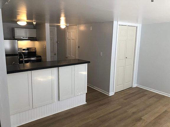 Living room w/ breakfast bar