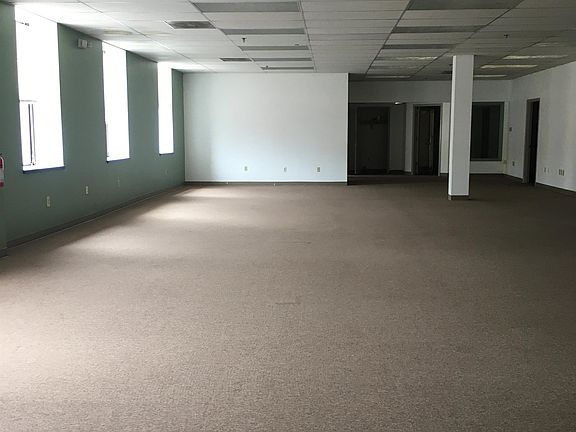 Another picture of huge open space. Plenty of room for cubicles or reception & waiting area.
