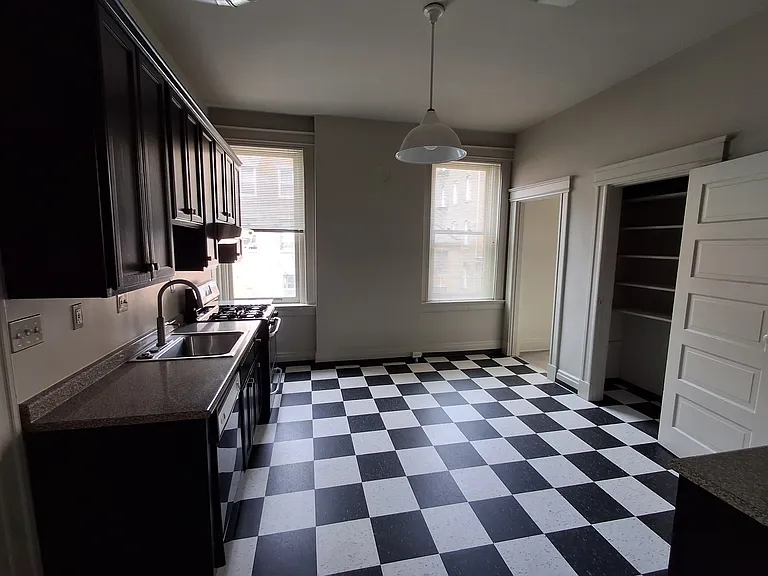 In addition to the many 48" cabinets, there's a large pantry.