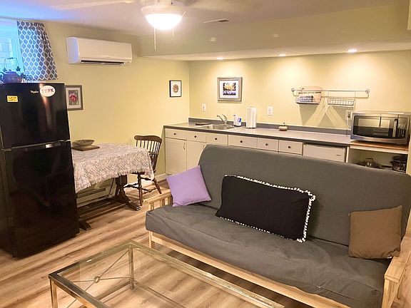 Full size futon in living room, separate heat/ac and thermostat.