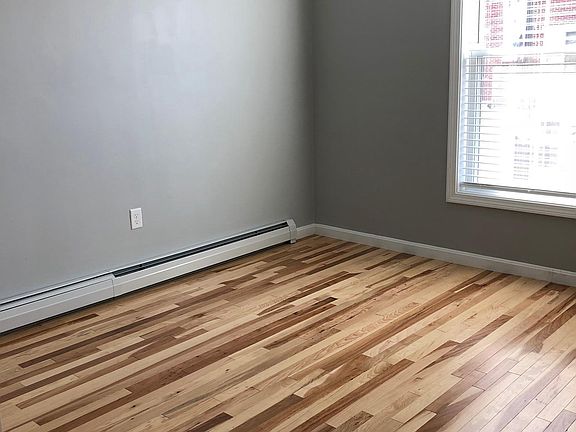 Large bedroom with lots of natural light