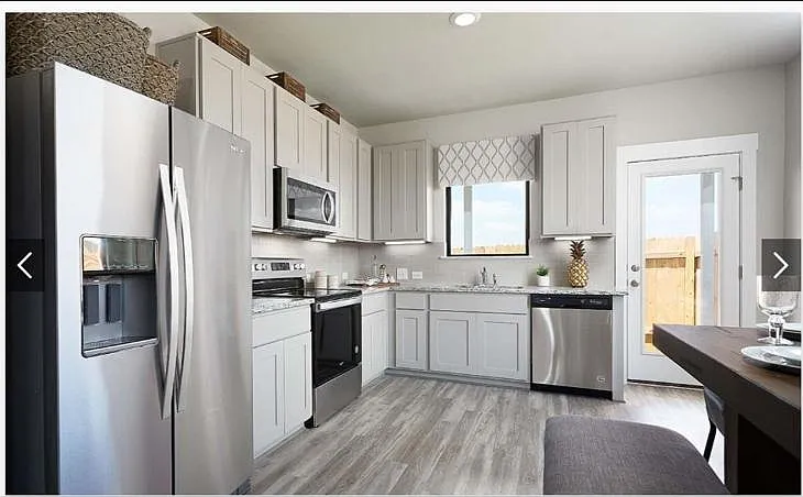 Model home picture for furniture arrangement reference only
