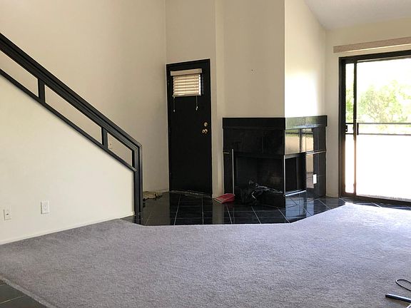 View to the entrance and fireplace