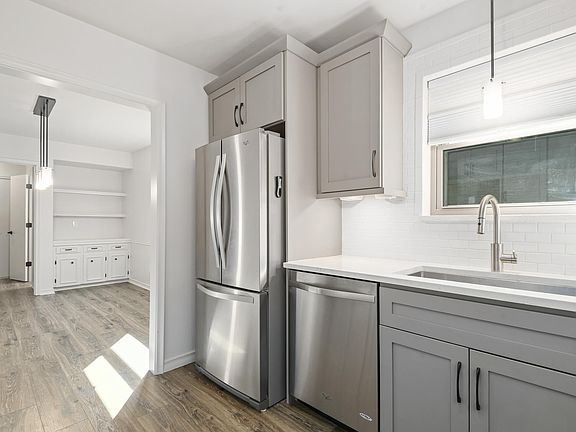 Kitchen/Dining/door to half bath and laundry