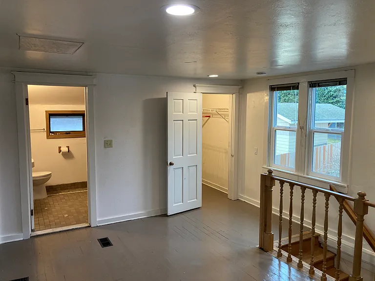 Upstairs den, showing 2nd floor bath and clothes closet