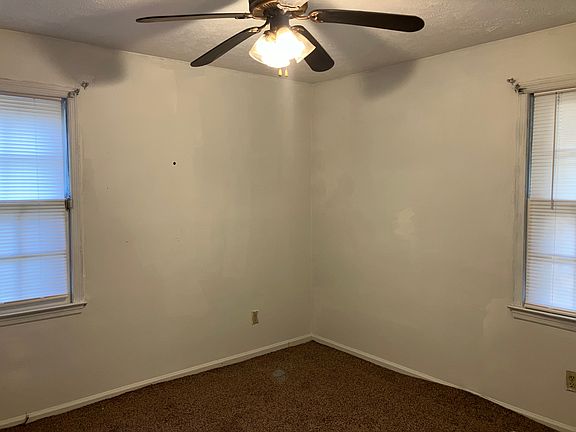 Carpeted master bedroom